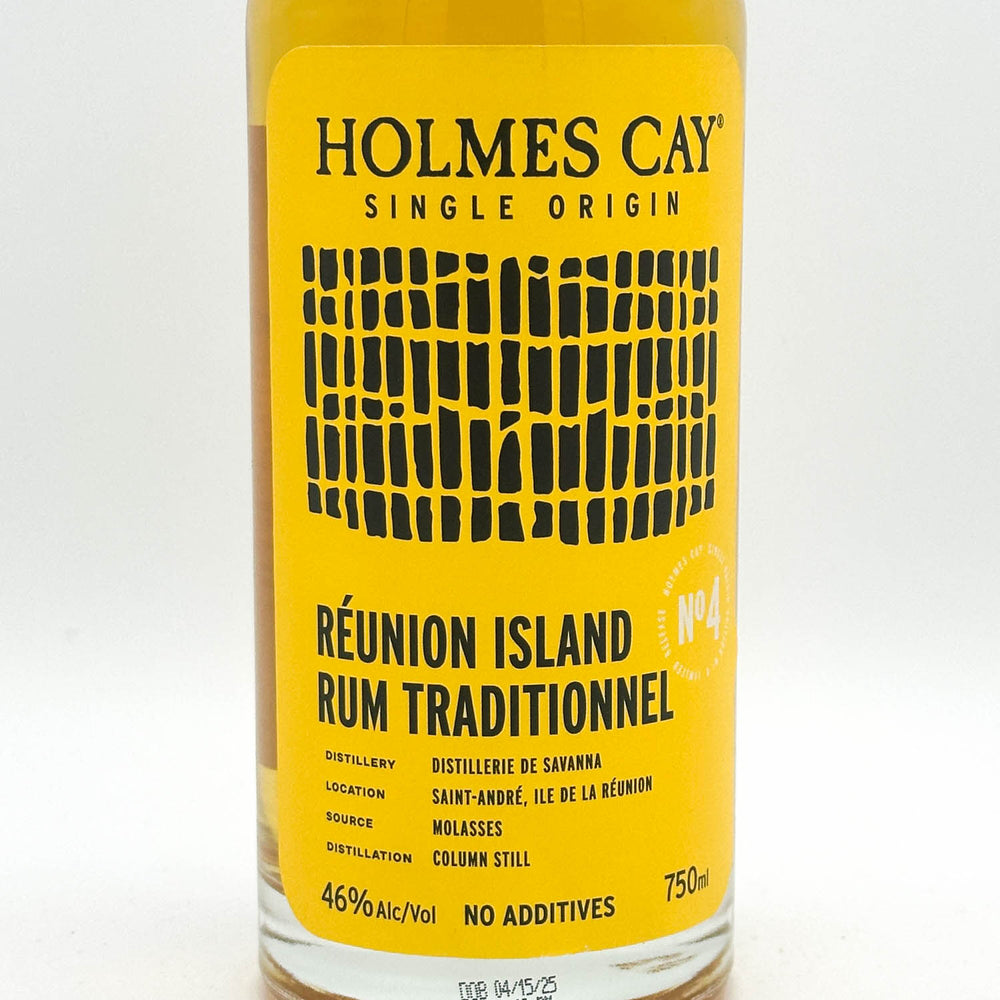 Bottle of Holmes Cay Réunion Island Rum Traditionnel with a yellow label on a white background