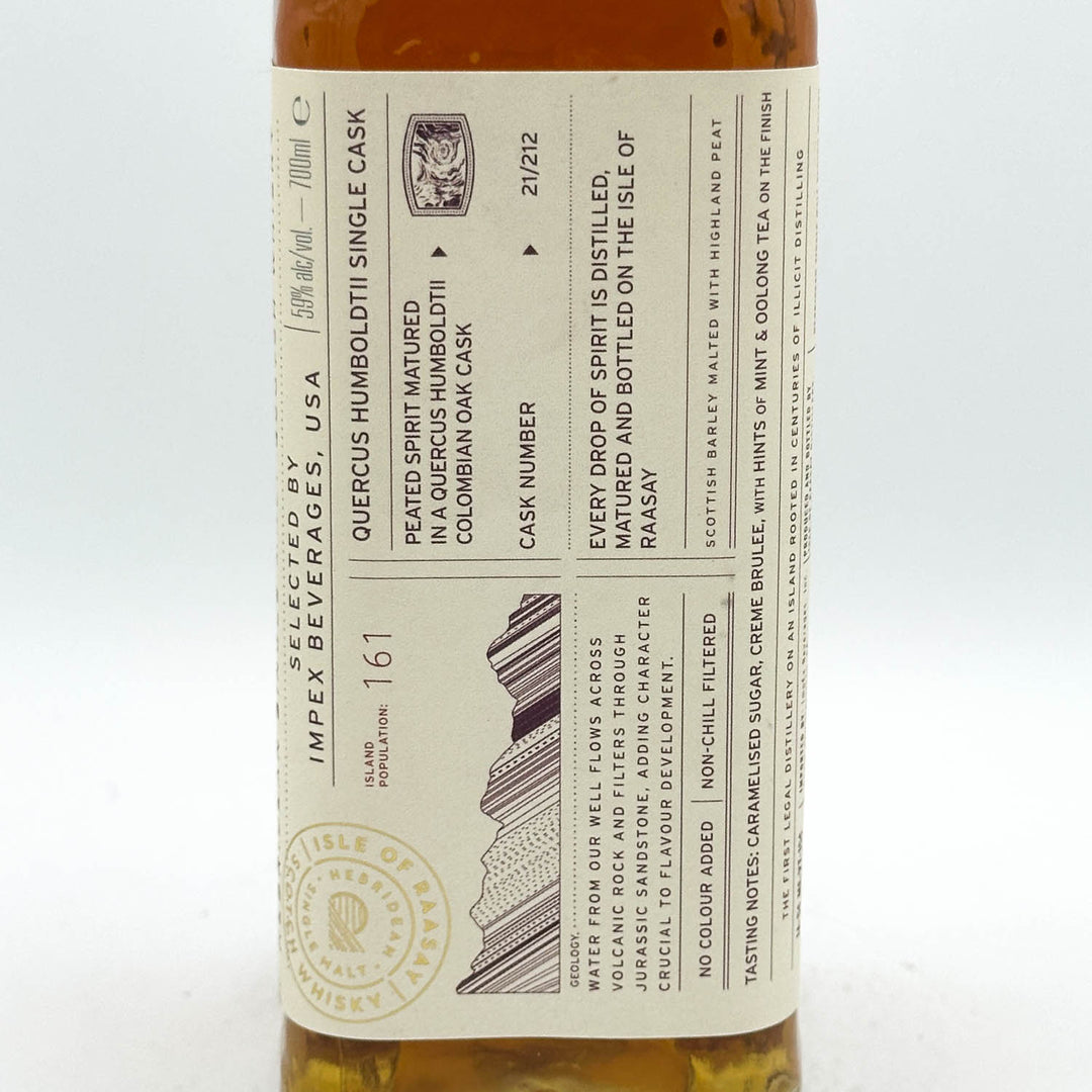 Bottle of whiskey with a detailed label on a white background