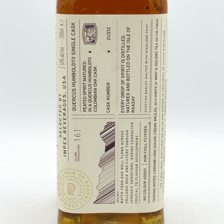 Bottle of whiskey with a detailed label on a white background
