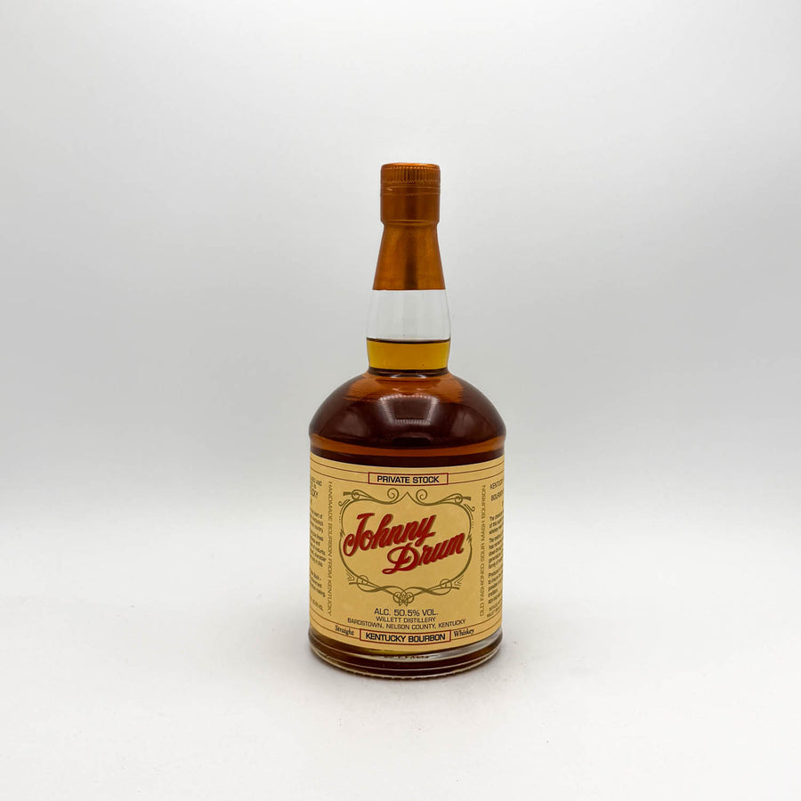 Bottle of Johnny Dram whiskey on a white background