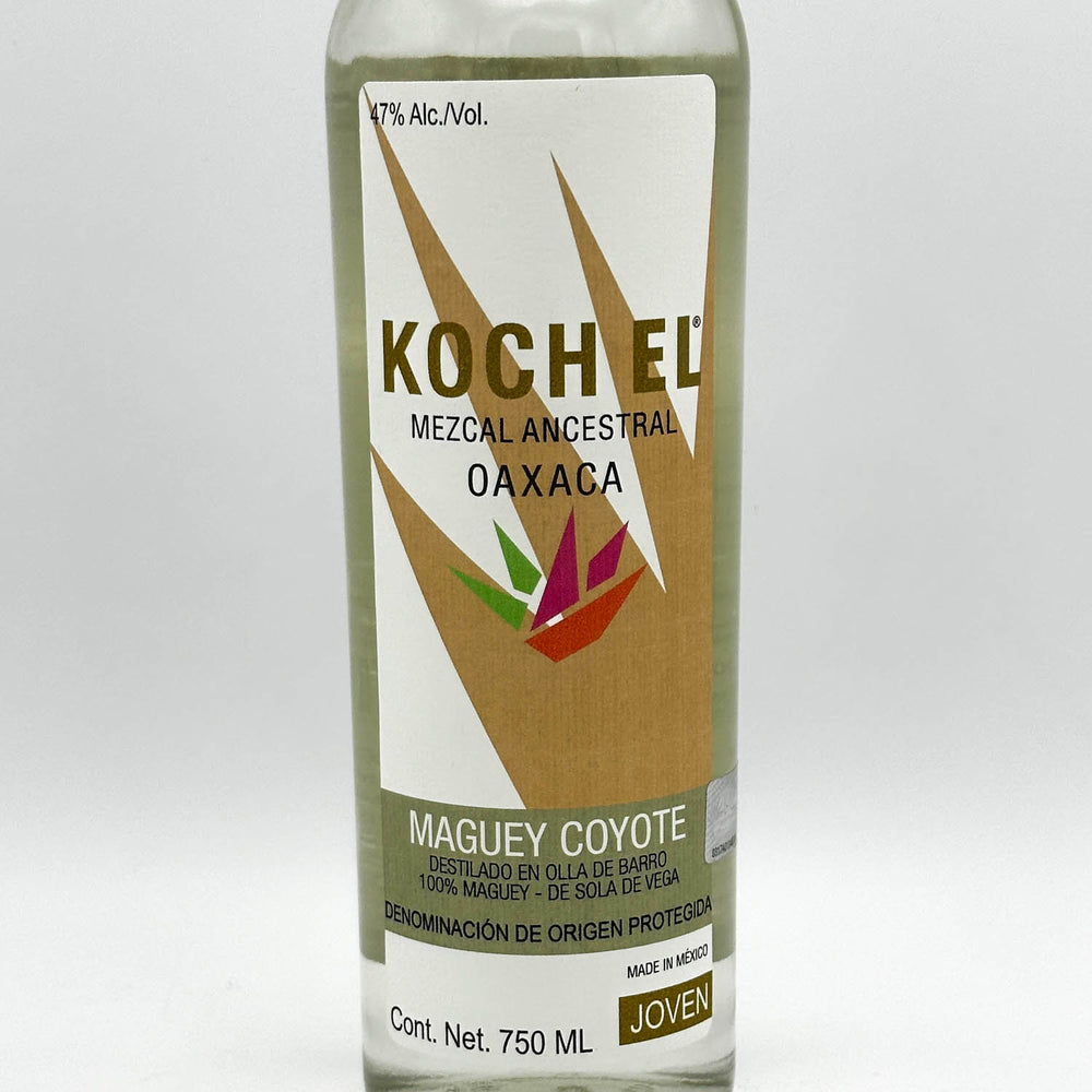 Bottle of Kochel Mezcal with a white label on a light gray background