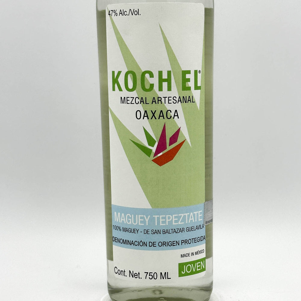 Bottle of Koch El Mezcal Artesanal Oaxaca with green label on a white background