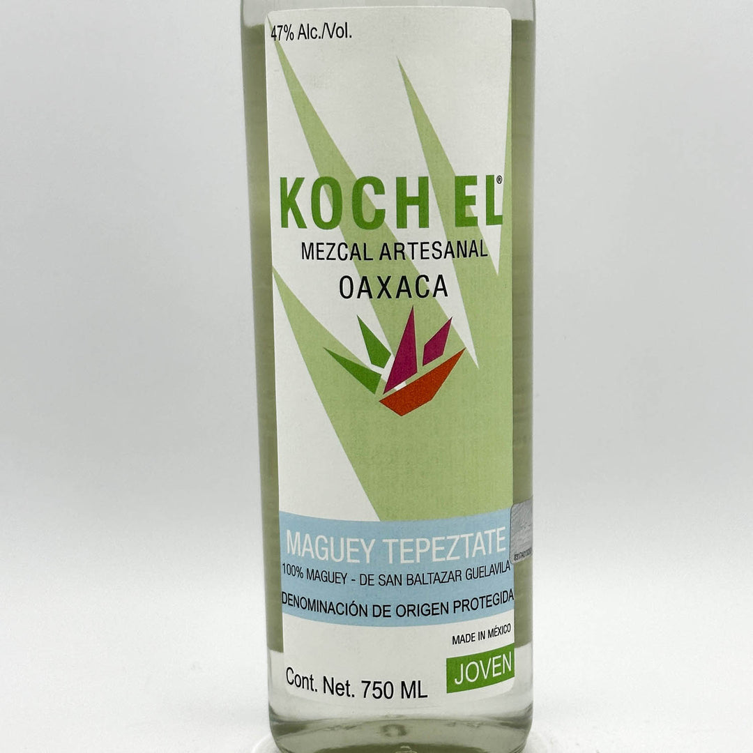 Bottle of Koch El Mezcal Artesanal Oaxaca with green label on a white background
