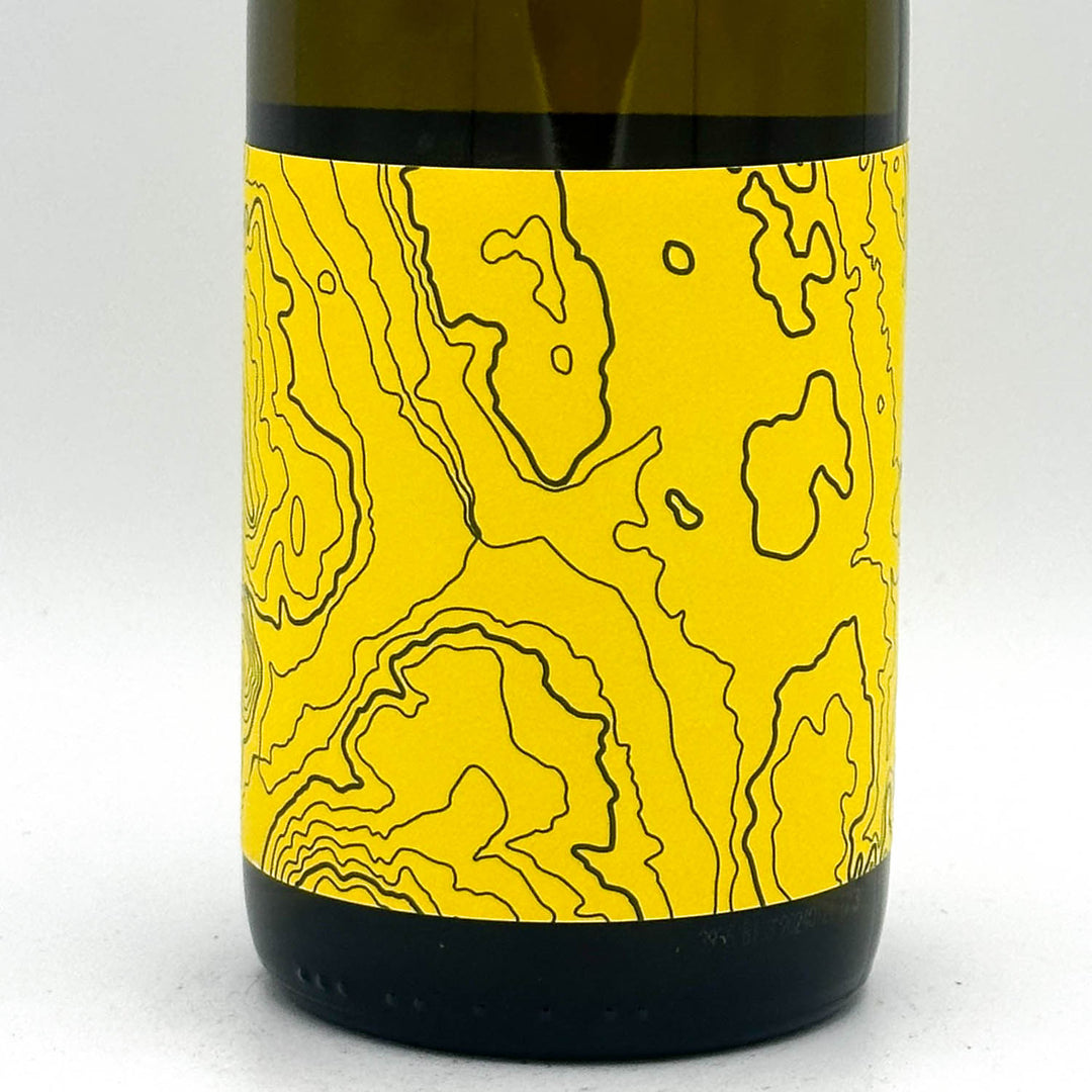 Wine bottle with a yellow label featuring black line art on a white background