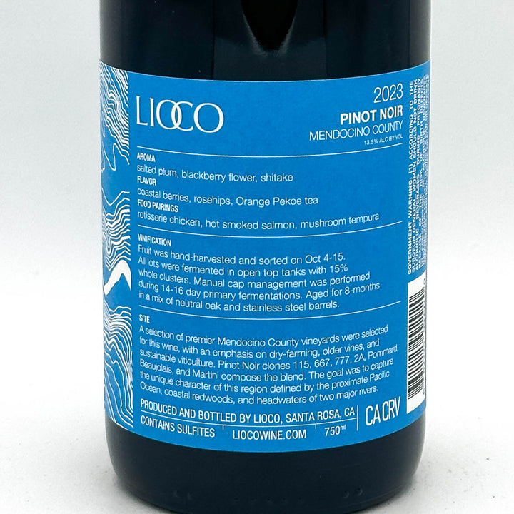 Wine bottle label with blue and white design on a white background