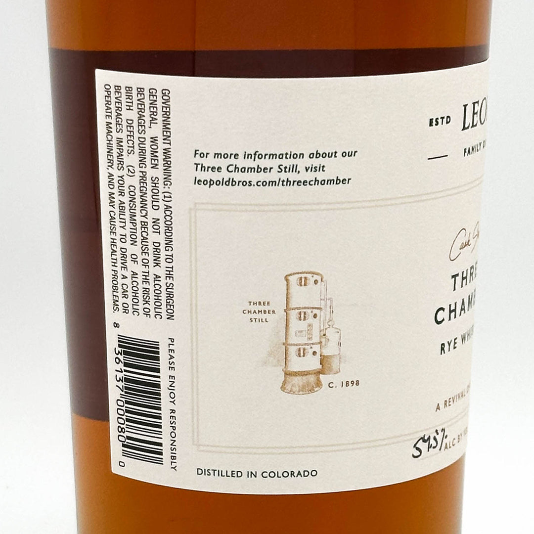 Close-up of a wine bottle label with text and branding details.