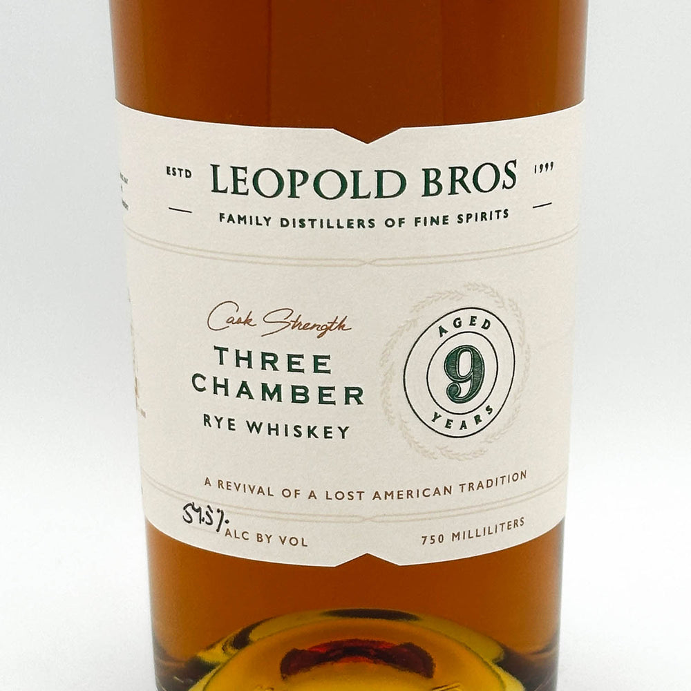 Leopold Bros Three Chamber Rye Whiskey bottle with label on a white background