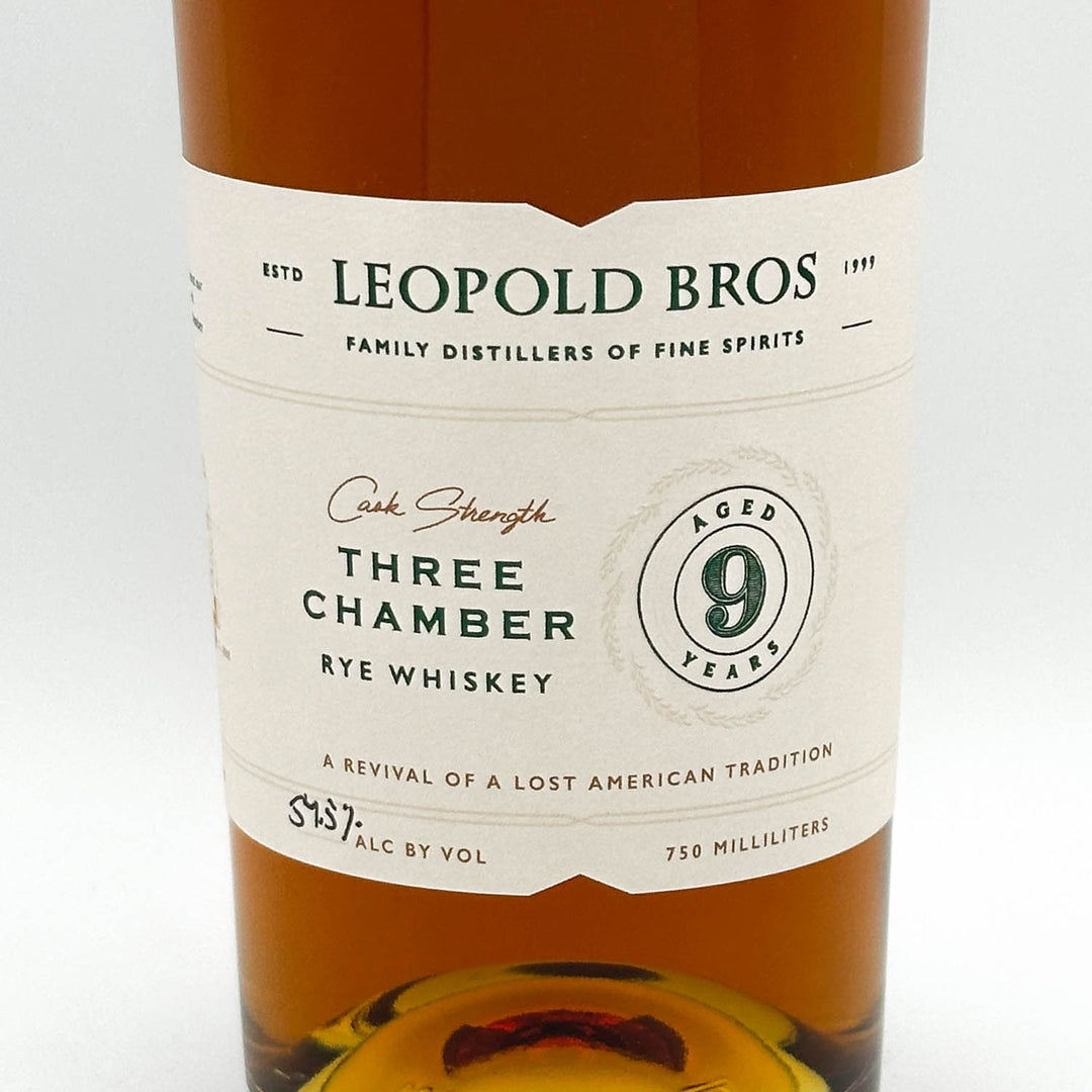 Leopold Bros Three Chamber Rye Whiskey bottle with label on a white background