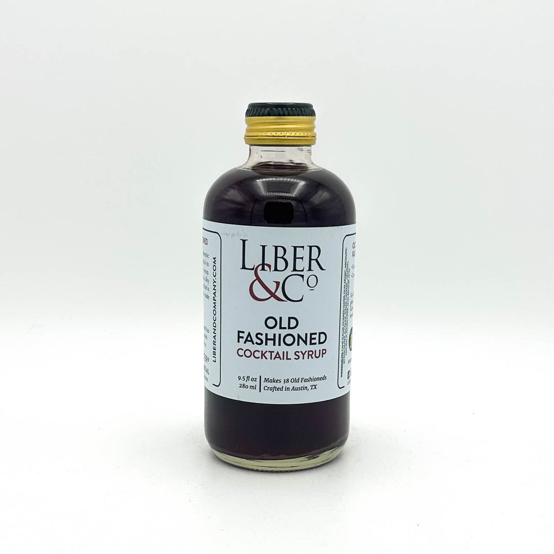 Bottle of Liber & Co. Old Fashioned Cocktail Syrup on a white background