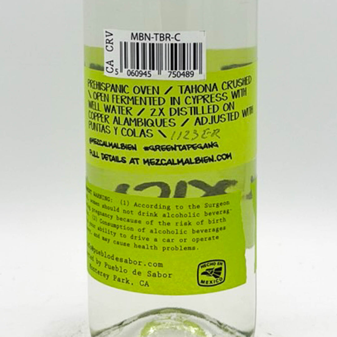Bottle label with text and a barcode on a white background