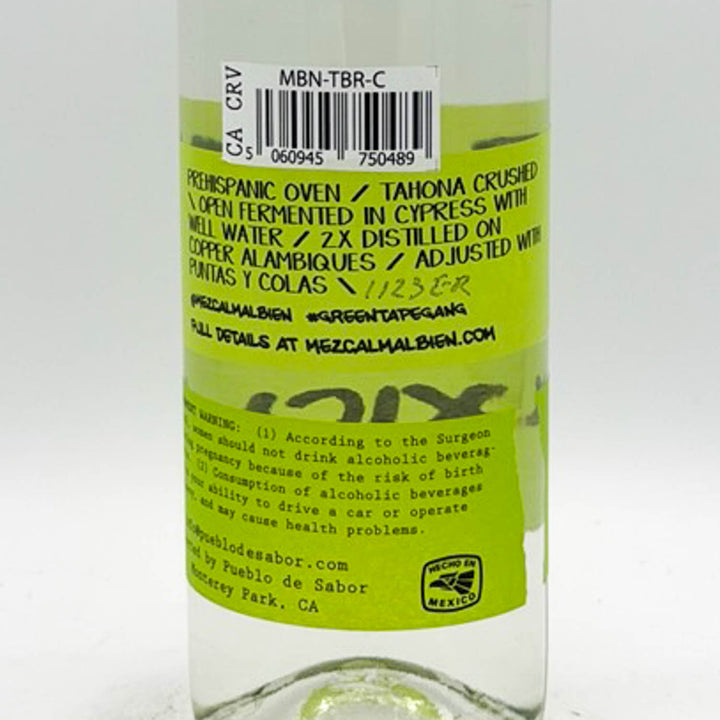 Bottle label with text and a barcode on a white background
