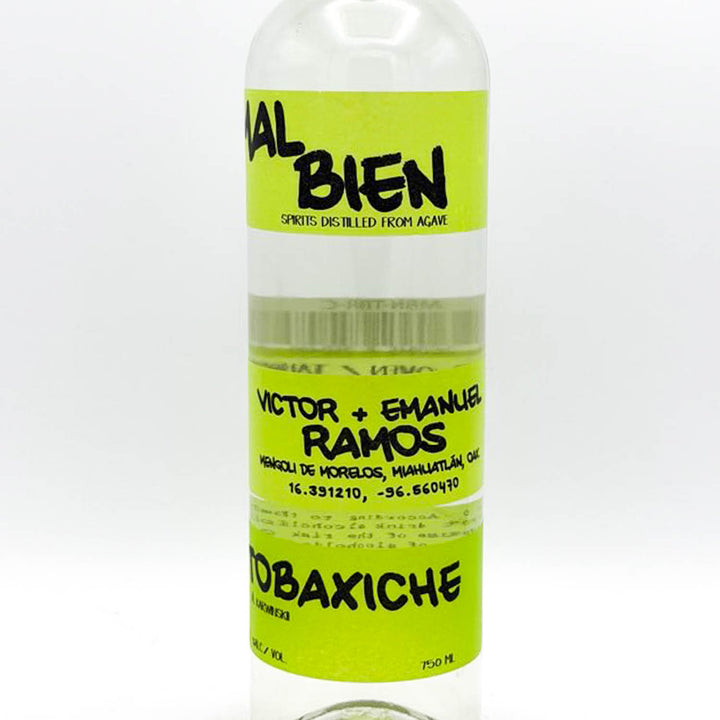 Bottle of Tobacische with a green label on a white background