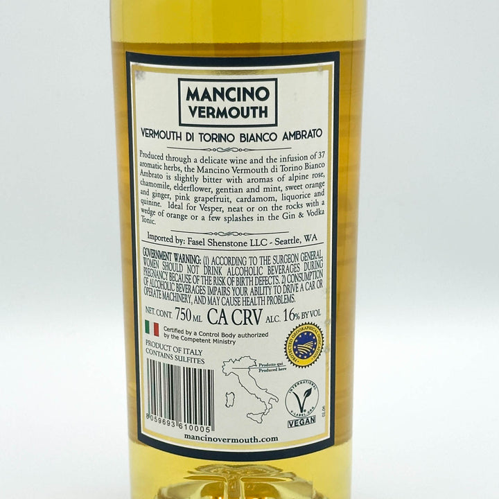 A bottle of Mancino Vermouth white vermouth wine with a cream and blue label, set against a plain white background.