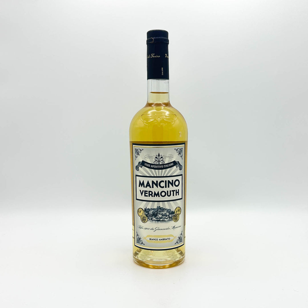 A bottle of Mancino Vermouth white vermouth wine with a cream and blue label, set against a plain white background.