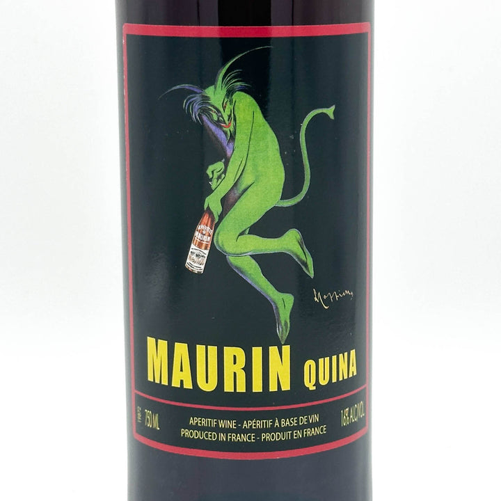 Maurin Quina wine bottle with green character illustration on a black background
