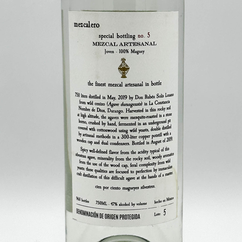 Label of mezcal with text and branding on a white background