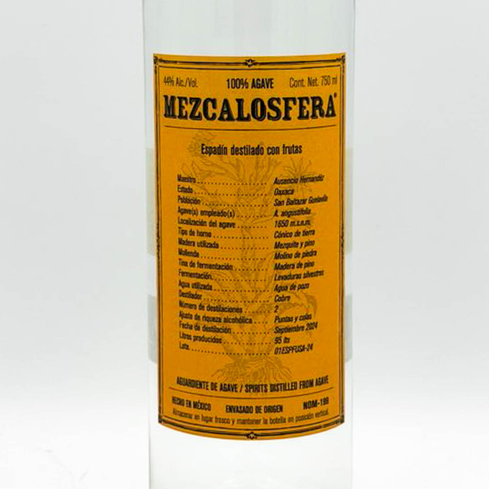 Bottle of Mezcalosfera with a yellow label on a white background