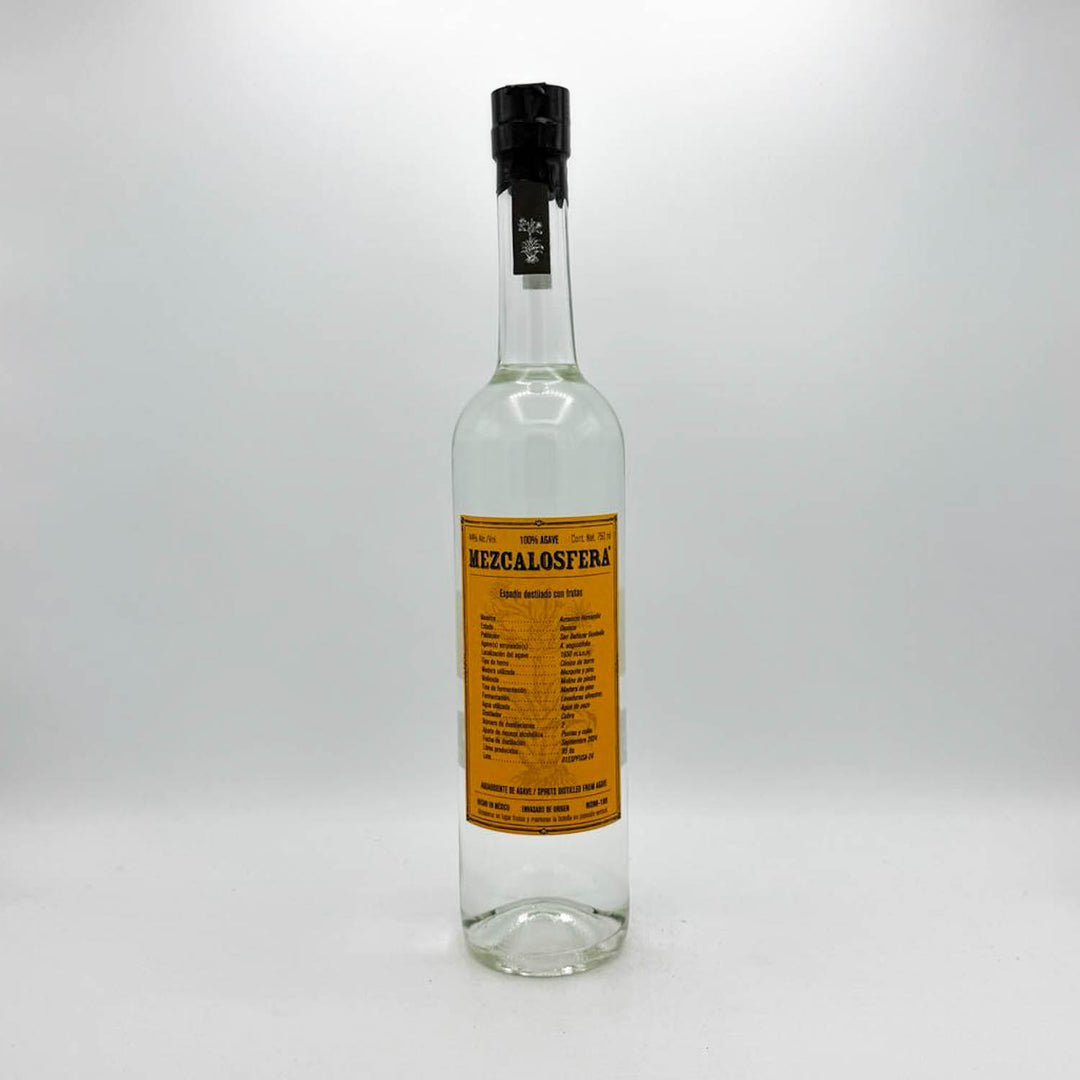 Clear bottle with a yellow label on a white background