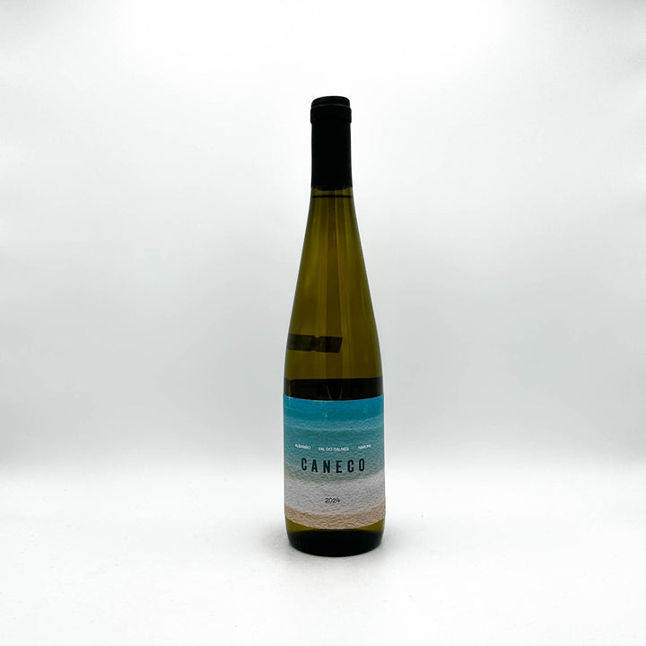 Wine bottle with a blue label on a white background