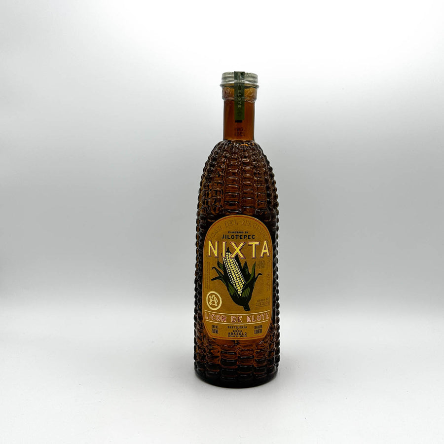 Bottle of Nixta liquor on a white background