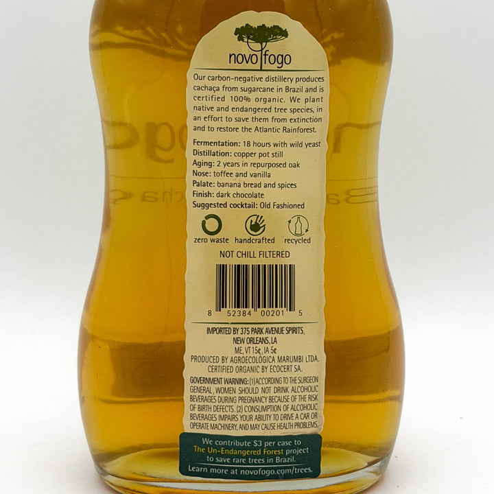 Bottle of novofogo Barrel-Aged Cacháça on a white background