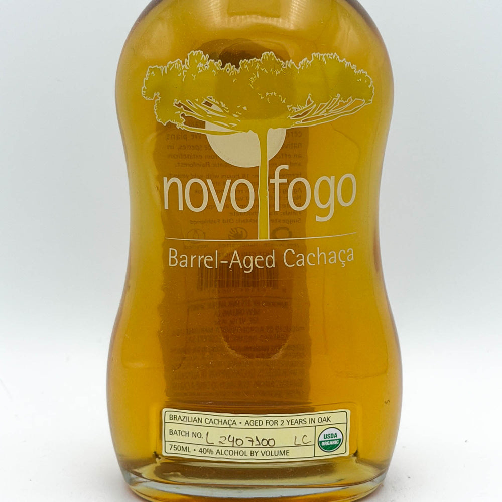 Bottle of novofogo Barrel-Aged Cacháça on a white background