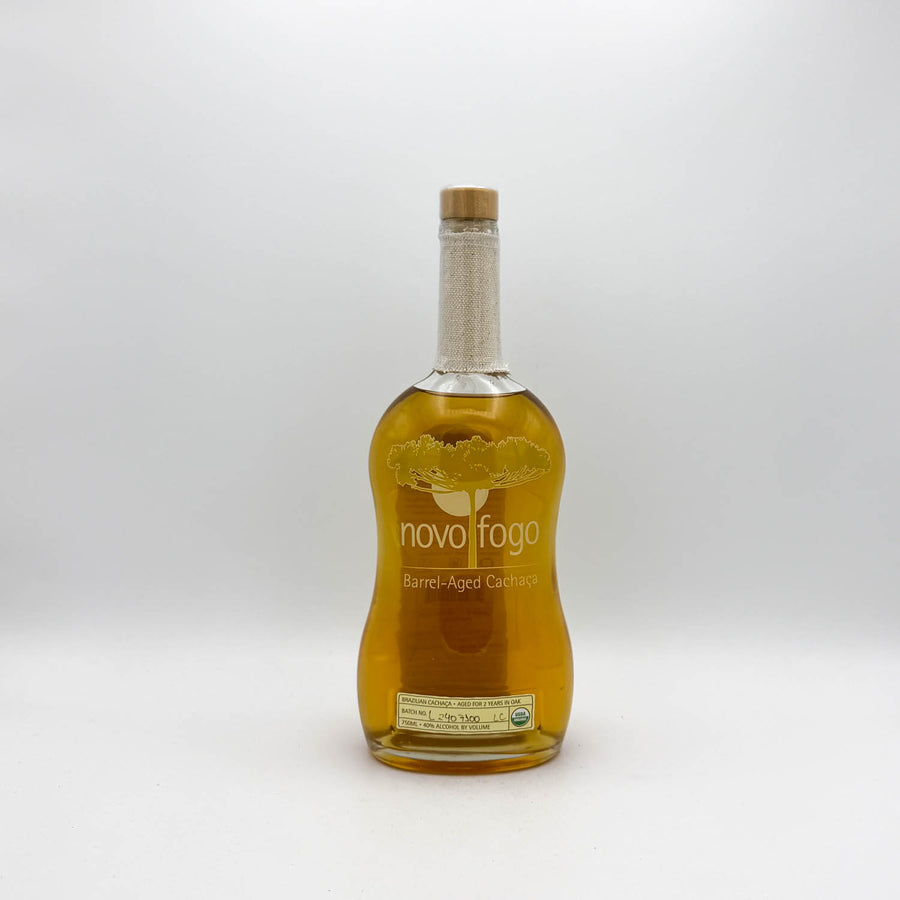 Bottle of Novo Fogo rum on a white background