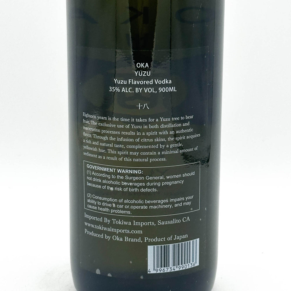 Back label of a Yuzu-flavored vodka bottle on a white background