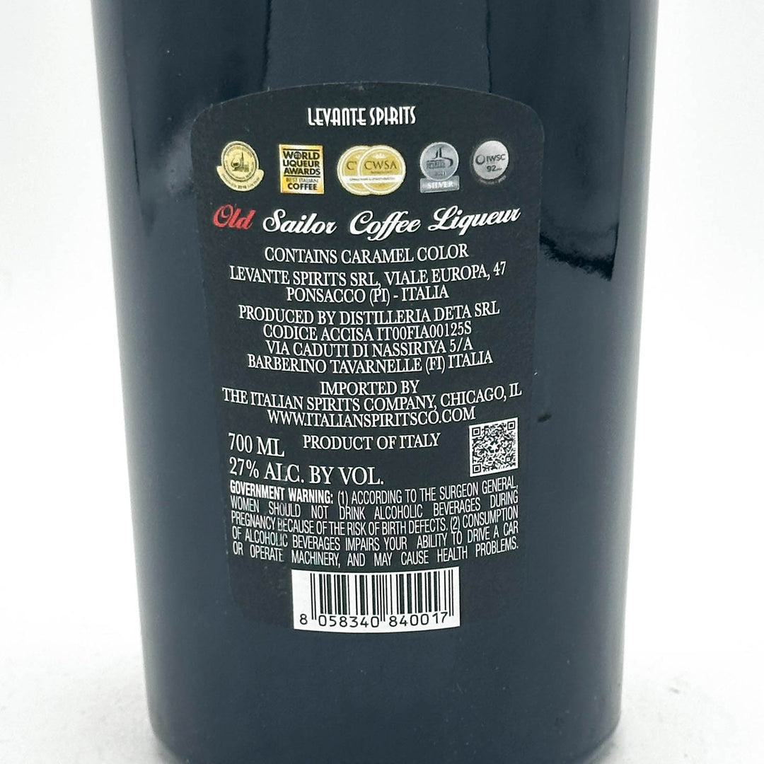 Close-up of the back label of a dark bottle of Levantine Spirits Old Sailor Coffee Liqueur, showing product details, logos, and a barcode on a white background.