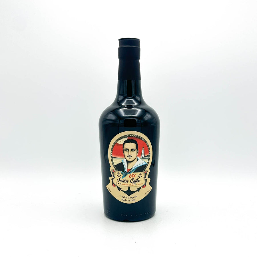 A dark glass bottle of 'El Tequila' by Tequila Co., featuring a vintage-style illustrated label with a portrait of a man and a lighthouse, set against a plain white background.