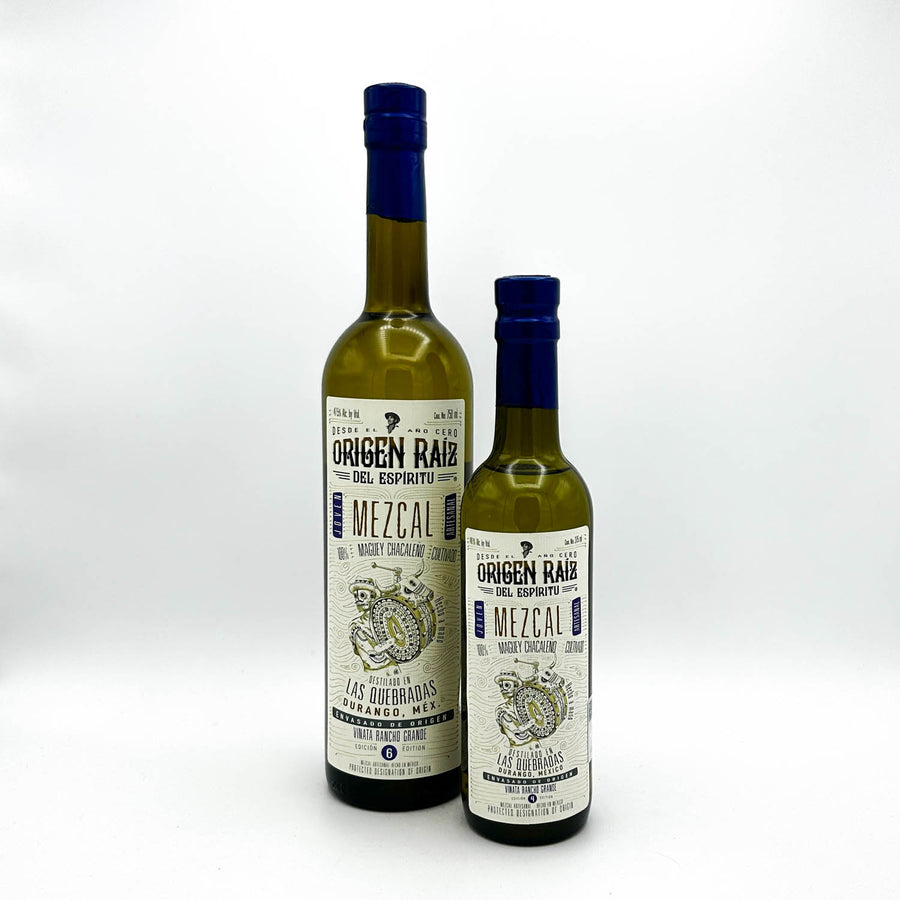 Two bottles of Mezcal on a white background