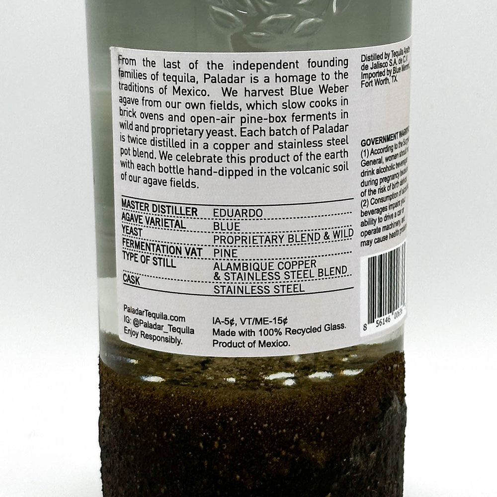 Back label of a Paladar tequila bottle with text and branding details.
