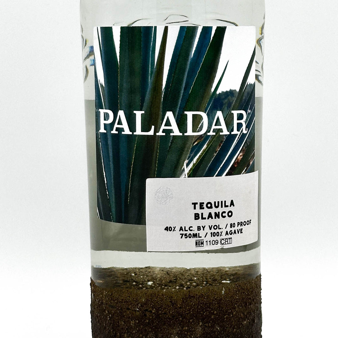 Paladar Tequila Blanco bottle with agave plant image on a white background