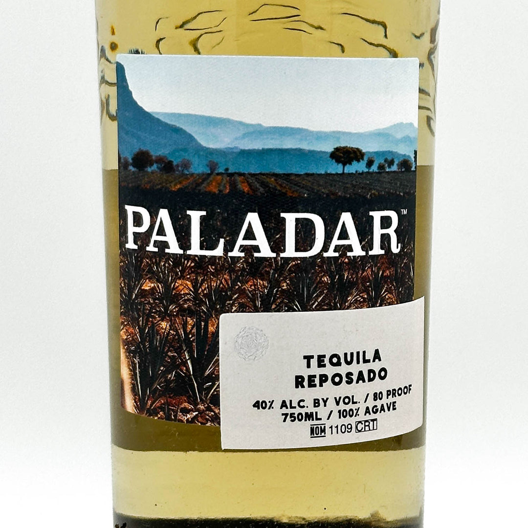 Paladar Tequila Reposado bottle with label showing landscape design