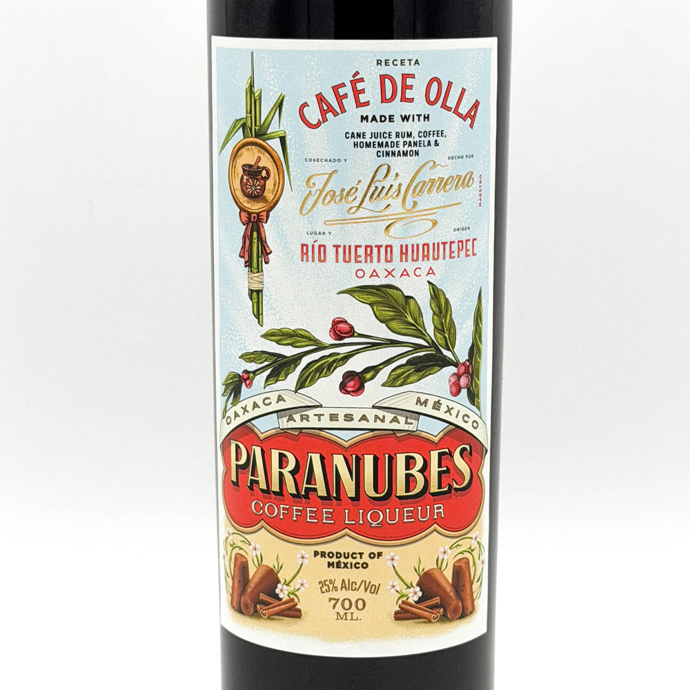 Bottle of Paranubes Coffee Liqueur with a colorful label on a white background