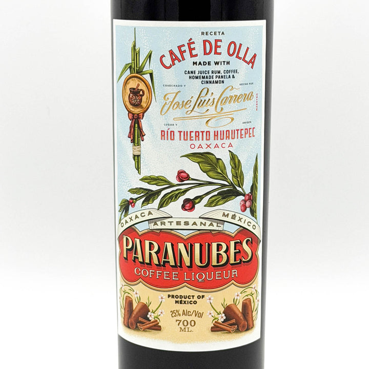 Bottle of Paranubes Coffee Liqueur with a colorful label on a white background
