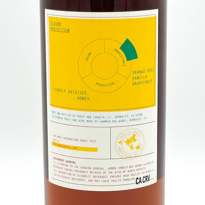 A close-up of a wine bottle label with a yellow and white design. The label reads 'Flavor Projection' and 'Lightly Oxidised Honey' with a circular diagram and a green slice.