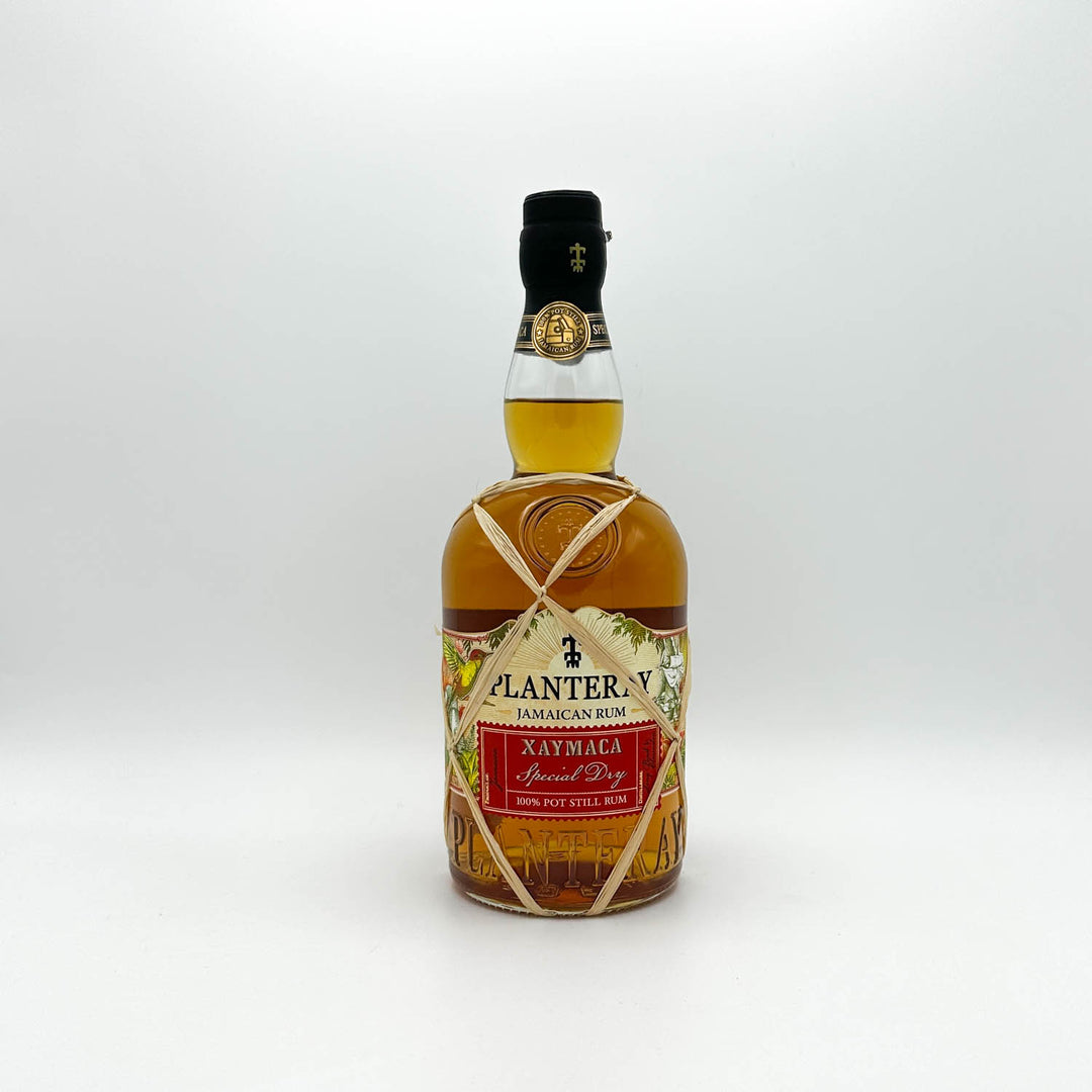 Bottle of Plantation Xaymaca Jamaican Rum on a white background
