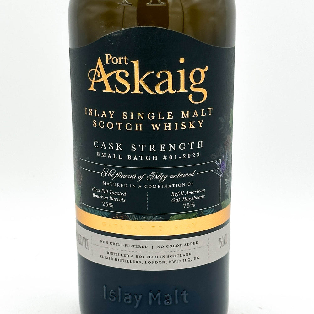 A bottle of Port Askaig Islay Single Malt Scotch Whisky, showing the dark label with gold lettering and a white band near the bottom.