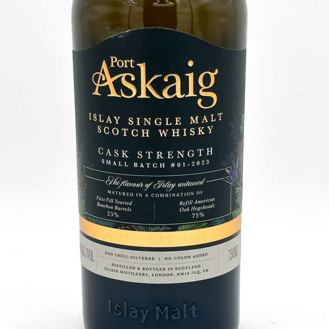 A bottle of Port Askaig Islay Single Malt Scotch Whisky, showing the dark label with gold lettering and a white band near the bottom.