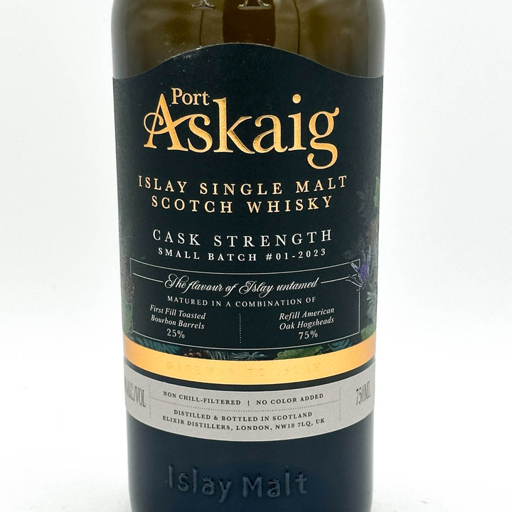 A bottle of Port Askaig Islay Single Malt Scotch Whisky, showing the dark label with gold lettering and a white band near the bottom.