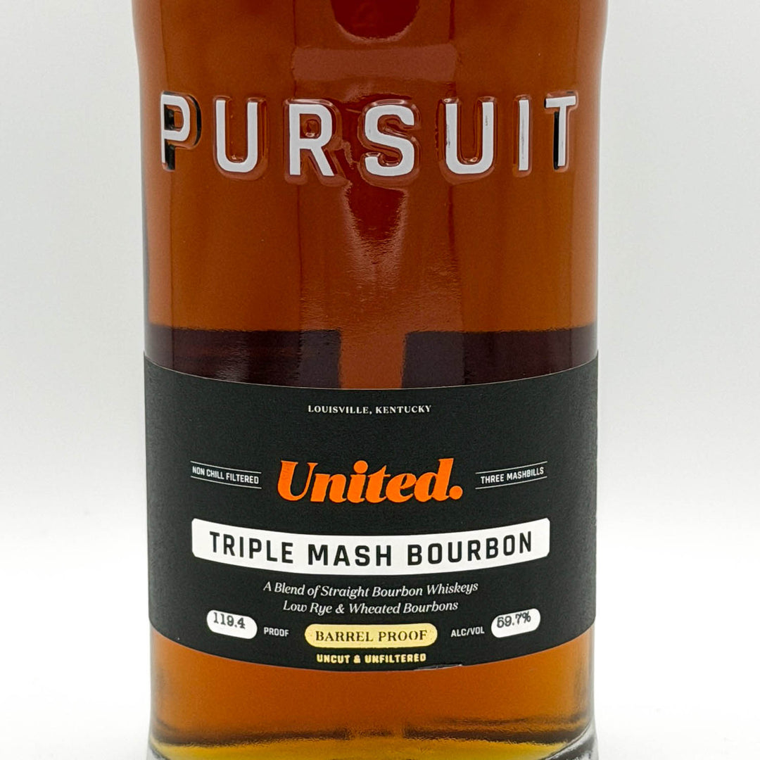 Bottle of Pursuit United Triple Mash Bourbon with a white background