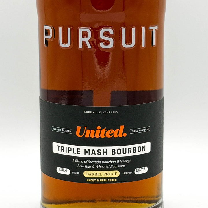 Bottle of Pursuit United Triple Mash Bourbon with a white background