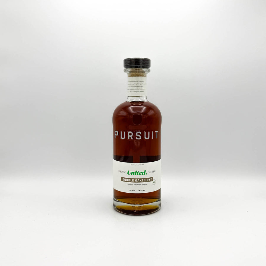 Bottle of Pursuit whiskey on a white background