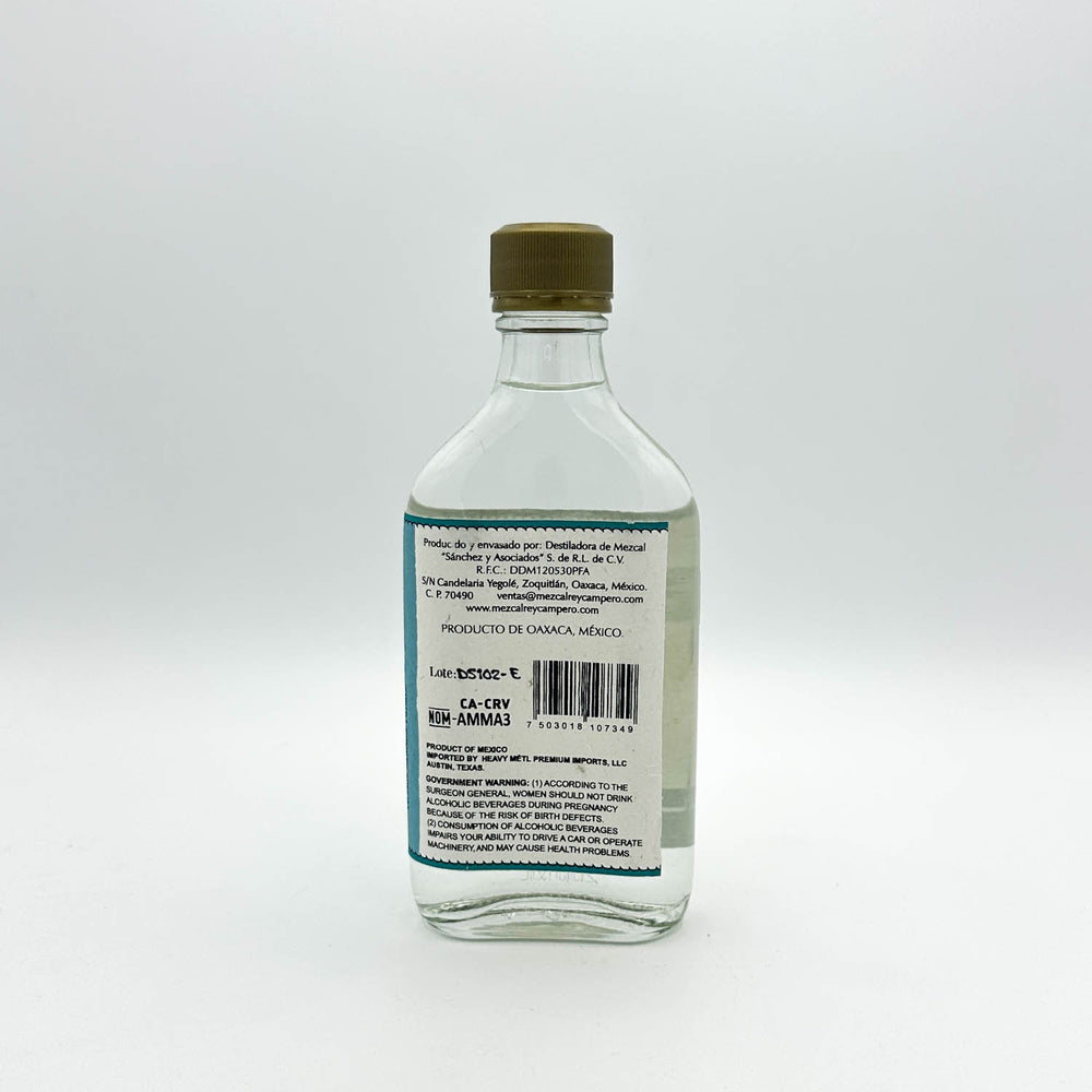 Clear bottle with a label on a white background