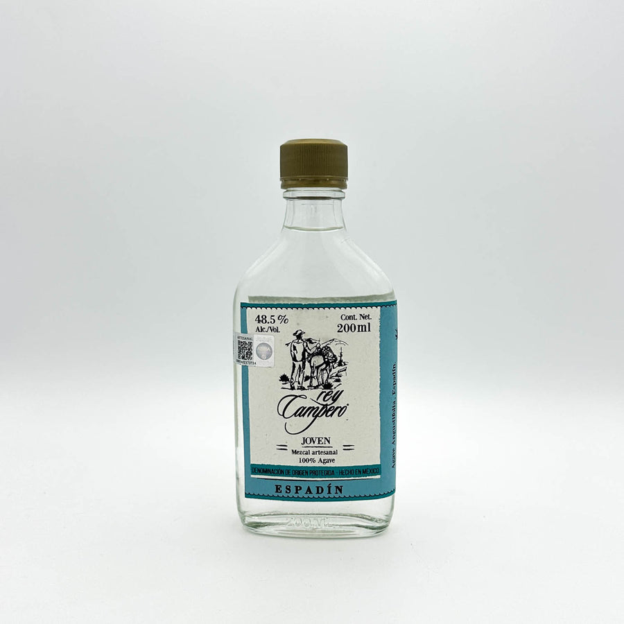 Clear bottle with a label on a white background