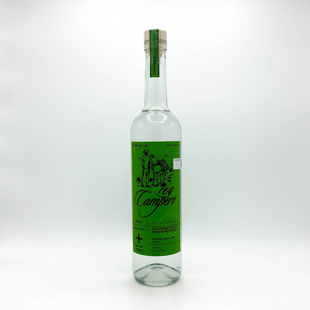 A clear glass bottle of Tequila Campari with a vibrant green label and a cork stopper, photographed against a seamless white studio background.