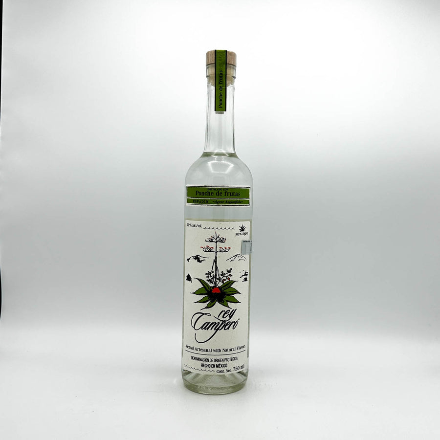 Clear bottle with a green label on a white background