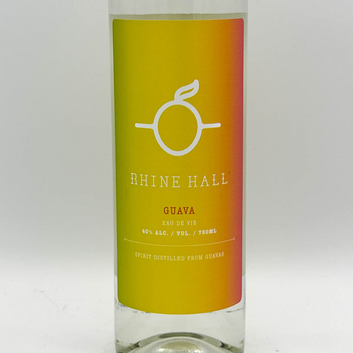 Bottle of Rhine Hall Guava Eau de Vie with a colorful label on a white background