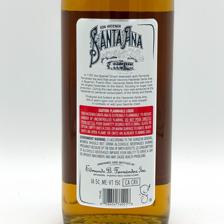 Bottle of Santa Ana rum with a label on a white background